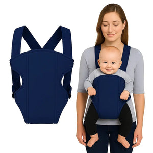 Parent carrying baby in a navy blue carrier belt with padded shoulder straps