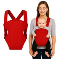 Parent carrying baby in red carrier belt with padded shoulder straps