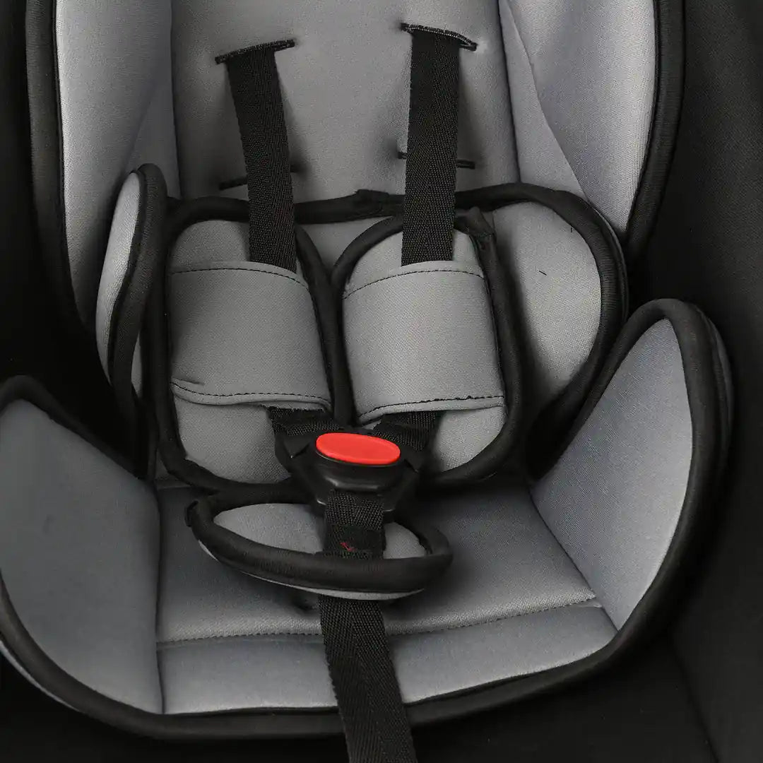 Close-up of baby carrycot safety harness and buckle