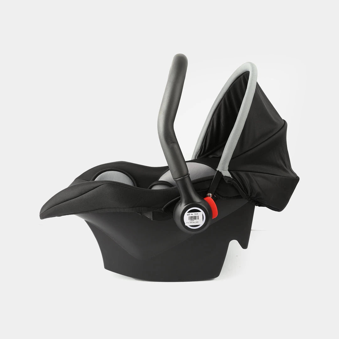 Black and red baby carrycot shown in reclined position