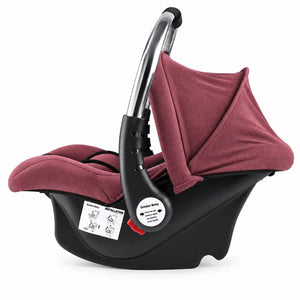 Red baby carry cot and car seat side view with stainless steel handle and adjustable canopy