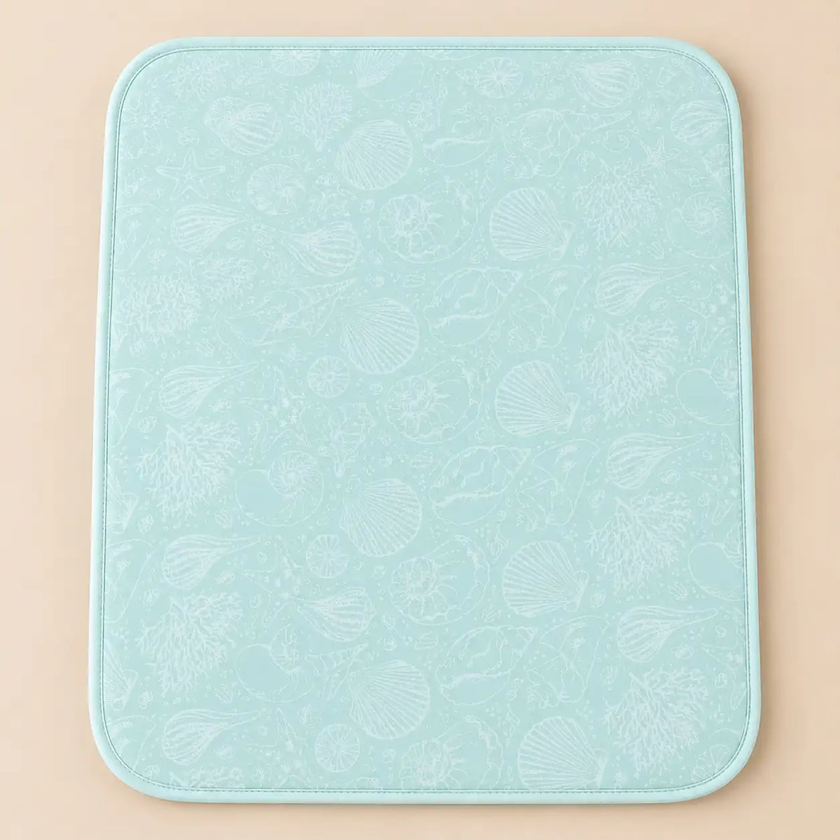 Aqua blue waterproof baby changing sheet with white seashell pattern