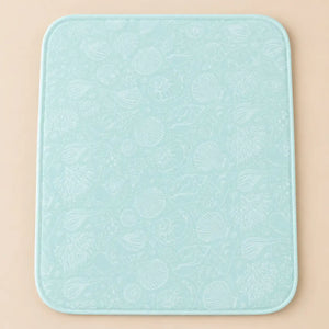 Aqua blue waterproof baby changing sheet with white seashell pattern