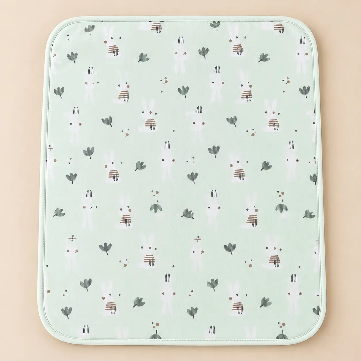 Mint green waterproof baby changing sheet with white bunny and leaf design