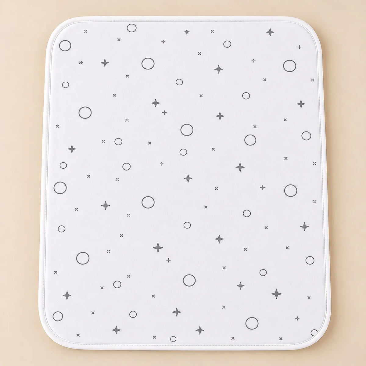 White waterproof baby changing sheet with grey stars and circles, 17x22 inch