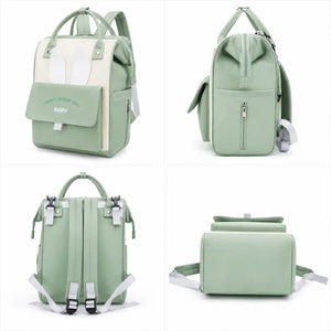 Mint green baby diaper backpack showing front, side, back and bottom views
