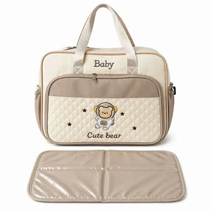 Beige Baby Diaper Bag with Foldable Changing Mat Multiple Compartments and Side Bottle Pockets