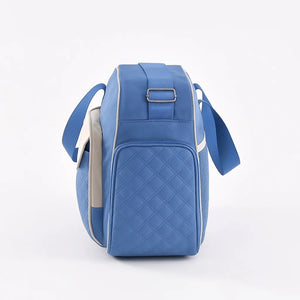 Blue large capacity baby diaper bag side view with detachable shoulder strap