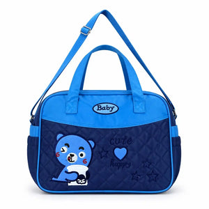 Blue premium baby diaper bag with bear design, shoulder strap and side pockets