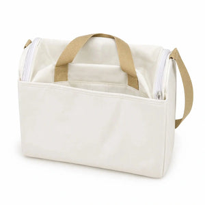 Beige baby diaper bag back view with adjustable shoulder strap