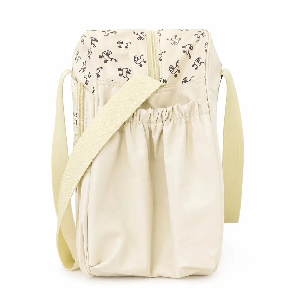 Cream baby diaper bag side view showing compact travel-friendly design