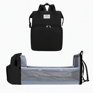 Black baby diaper backpack with foldable baby bed and mesh side panels