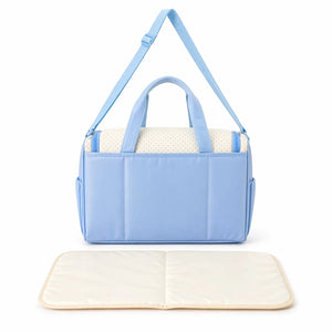 Sky Blue Baby Diaper Bag Front View with Included Changing Mat and Spacious Storage Compartments