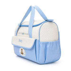 Sky Blue Baby Diaper Bag Side View Showing Bottle Pocket Handles and Adjustable Shoulder Strap