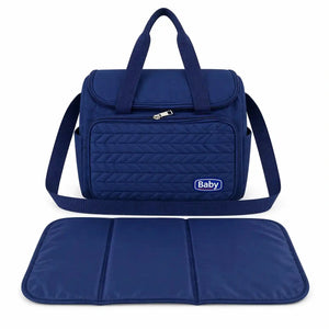 Navy blue water-resistant baby diaper bag with shoulder strap and foldable changing mat