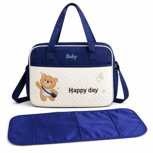 Navy blue premium baby diaper bag with teddy design, shoulder strap and matching changing mat