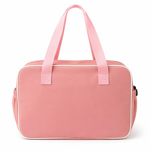 Pink Baby Diaper Bag Back View Showing Durable Water Resistant Material and Comfortable Carry Handles