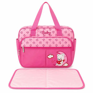 Pink baby print diaper bag with front pocket and foldable changing sheet