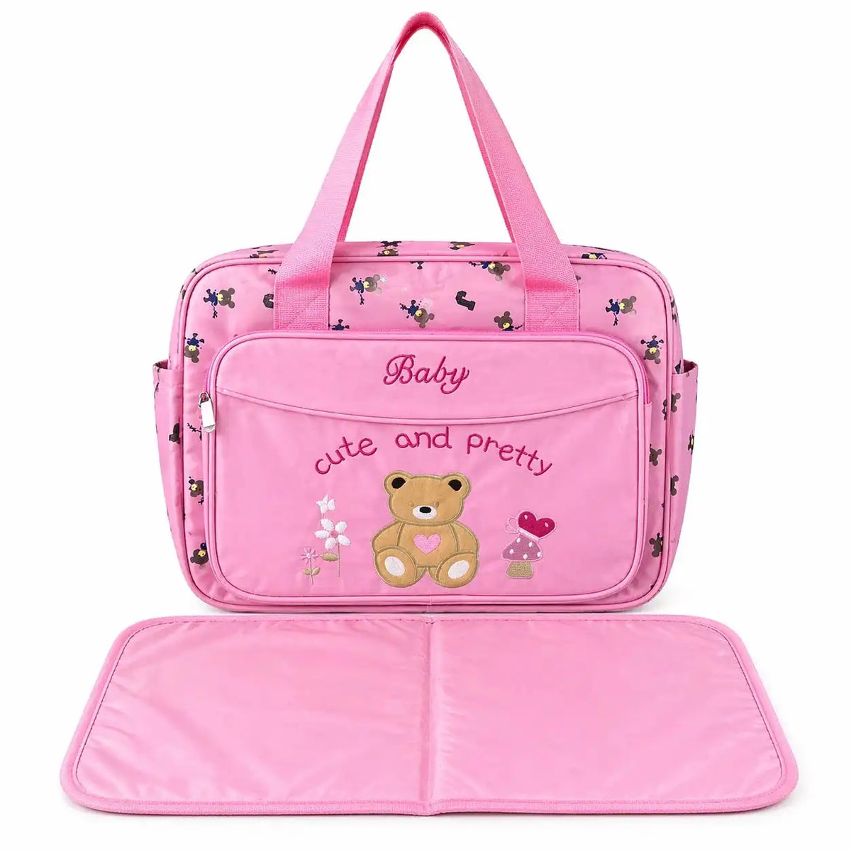 Pink teddy baby diaper bag with front zip pocket and changing mat