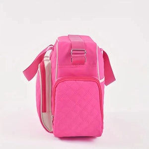 Pink large capacity baby diaper bag side view with adjustable shoulder strap