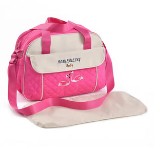 Large capacity pink baby diaper bag with shoulder strap and matching changing pad
