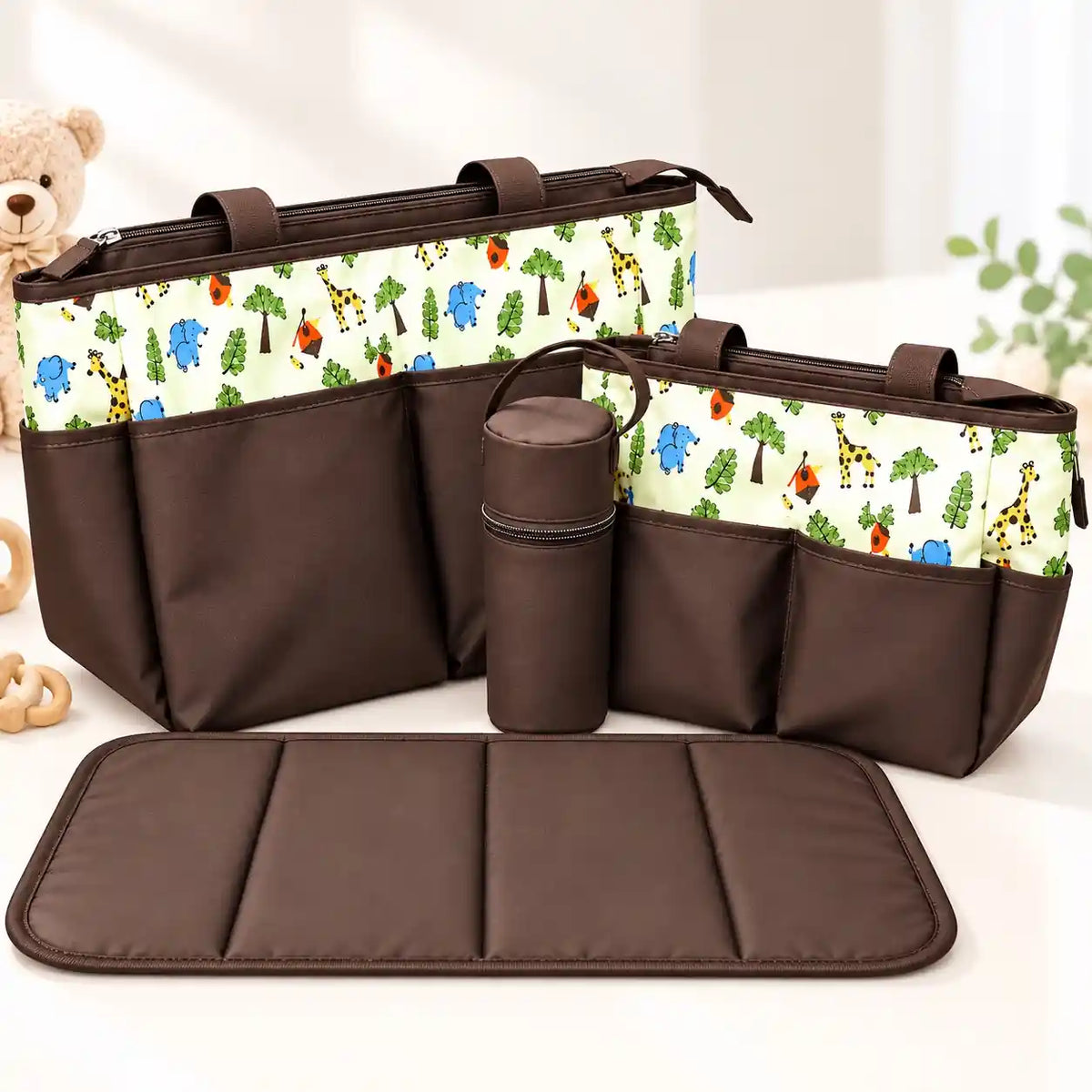 4-piece brown baby diaper bag set with animal print, two matching diaper bags, bottle holder and padded changing mat