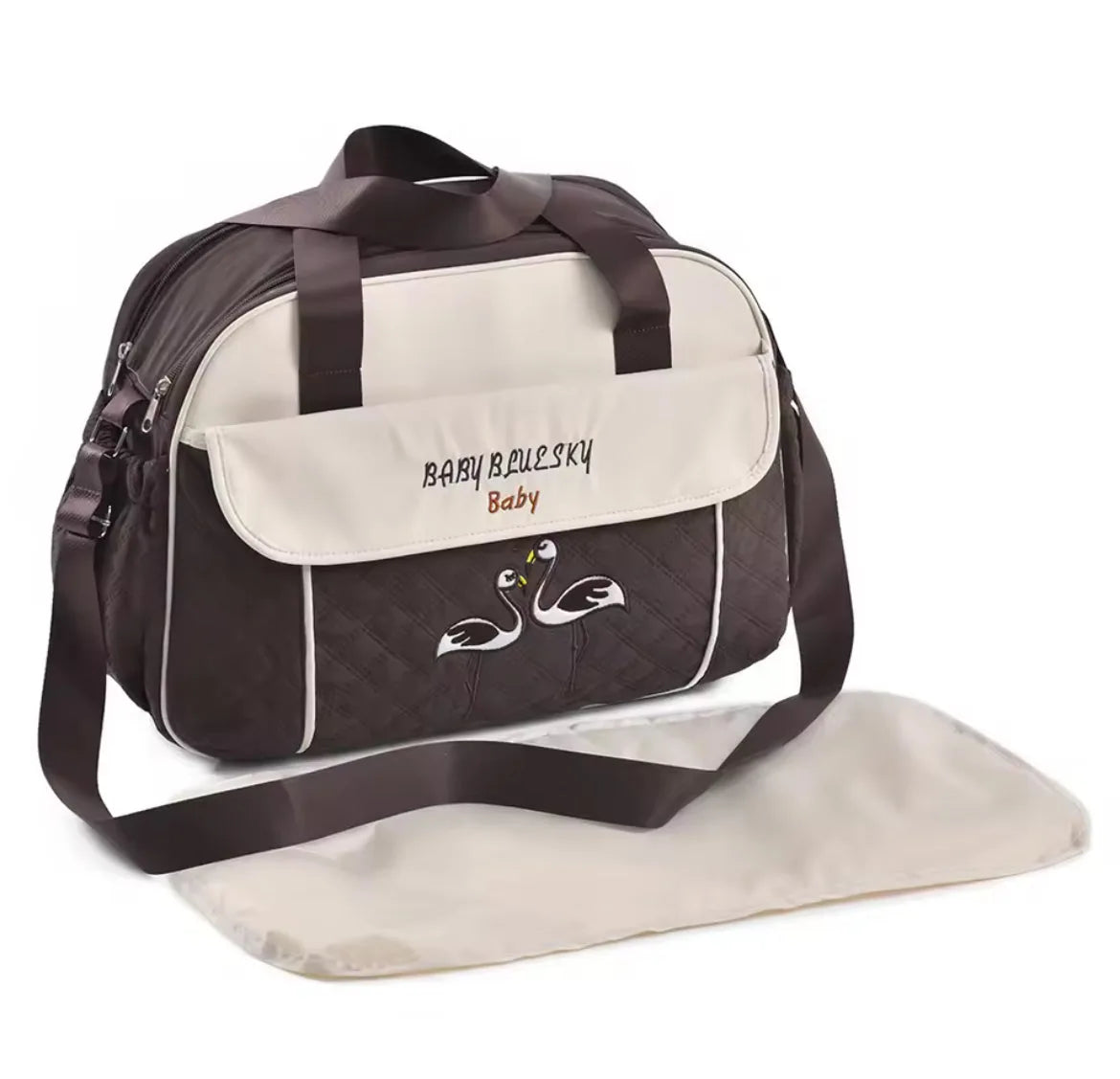 Chocolate brown baby diaper bag with adjustable shoulder strap and matching changing pad