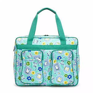 Green bear print baby diaper bag with spacious main compartment