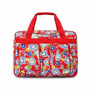 Red bear print baby diaper bag with multiple front pockets and zip closure