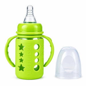 Green baby feeding bottle with handles, nipple and protective cap 