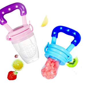 Pink and blue baby fruit feeder pacifiers with fruit