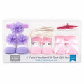 Hudson Baby 6-piece headband and sock gift set in purple pink and white with flower bow and eyelash patterns for 0-12 months