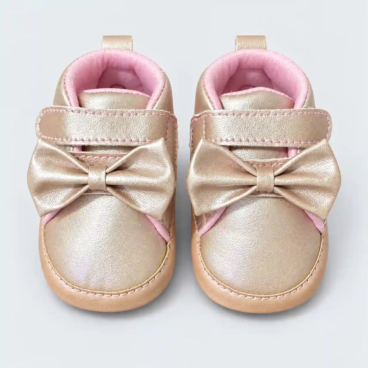 Champagne Gold Baby Girl Shoes with Oversized Bow and Pink Padded Collar Front View