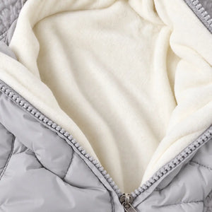 Close-up of grey baby winter puffer romper showing soft cream fleece inner lining and front zipper