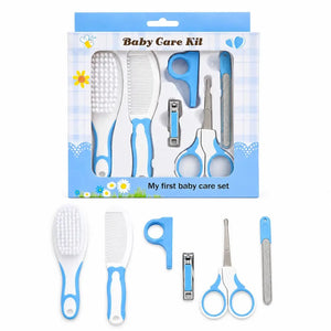 Blue 6 piece baby grooming care kit with brush, comb, nail clipper, scissors and nail file