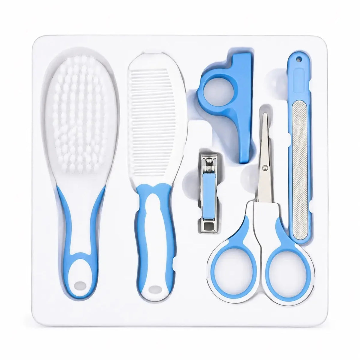 Blue baby grooming care kit arranged in tray with brush, comb, nail clipper, scissors and nail file