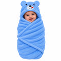 Baby wrapped in blue bear plush fleece hooded wrap sheet