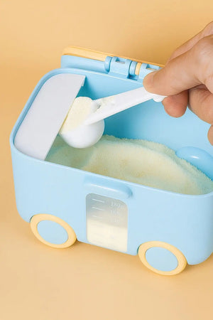 Blue baby milk powder container with scoop and measuring scale 