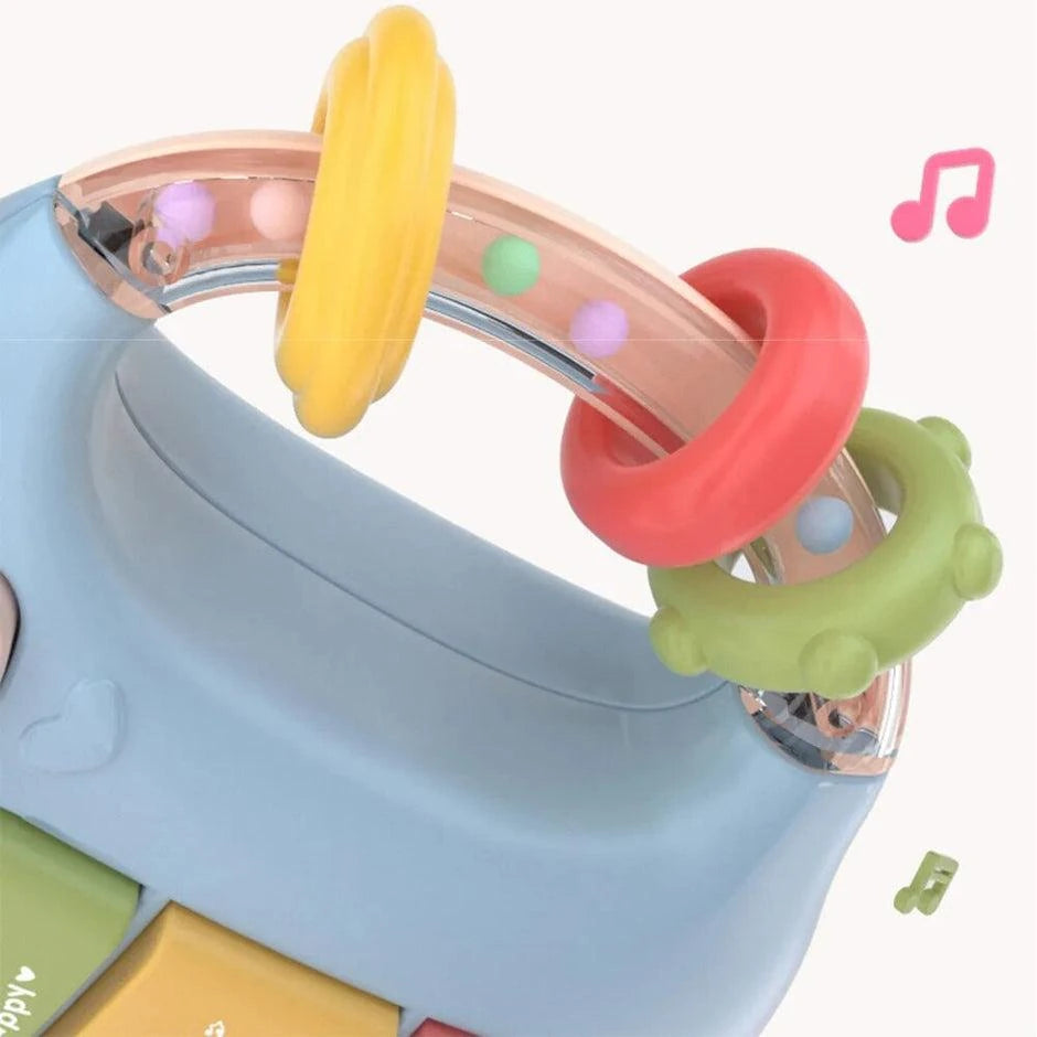 Baby musical feeding bottle colorful rattle handle close-up