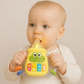 Baby using silicone teether toy with music, lights and easy-grip handles