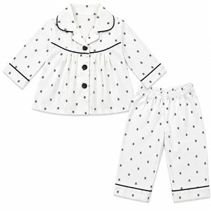Baby Girl Wearing White Printed Night Suit with Black Piping