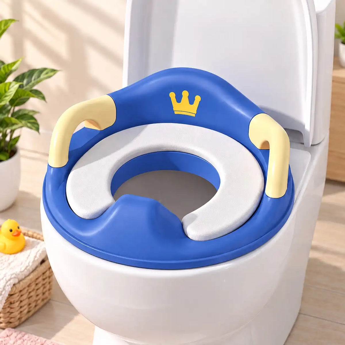Blue baby toilet training seat with handles and soft cushion
