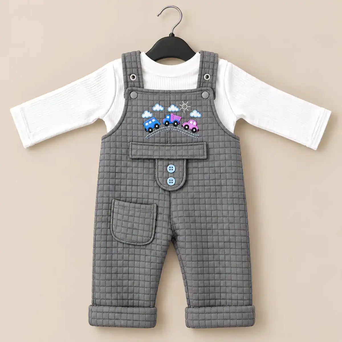 Grey baby quilted dungaree romper with white long sleeve inner shirt, embroidered car design and front pocket