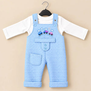 Sky blue baby quilted dungaree romper with white long sleeve inner shirt, embroidered car design and front pocket