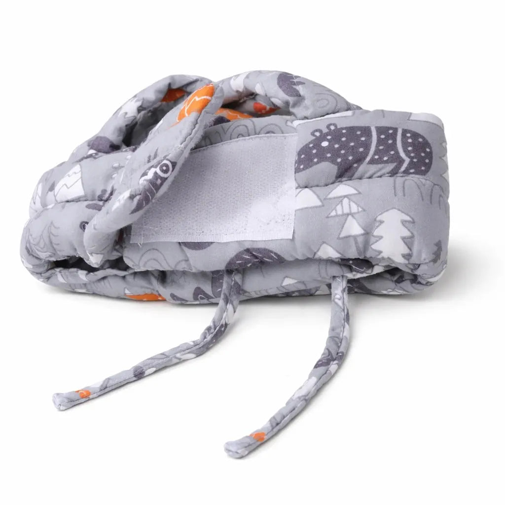 Adjustable Grey Baby Safety Helmet Side View with Lightweight Padded Head Protection Design