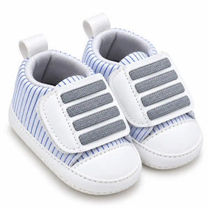 Blue striped baby prewalker shoes with grey detailing 3/4 view