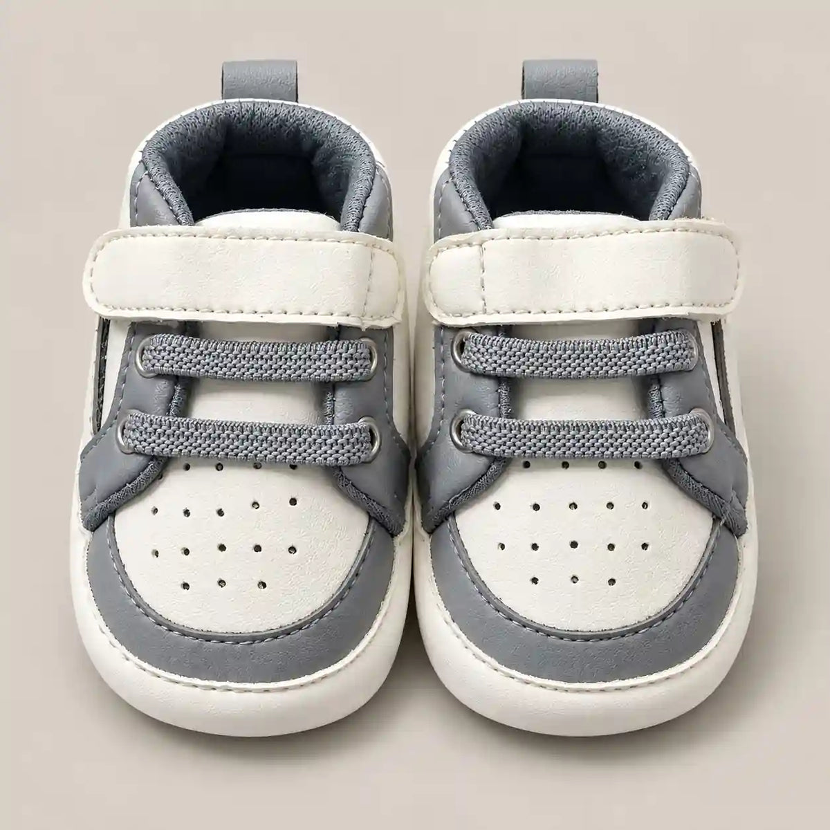 White and Grey Baby Boy Prewalker Shoes with Perforated Toe and Hook and Loop Strap Front View in Pakistan