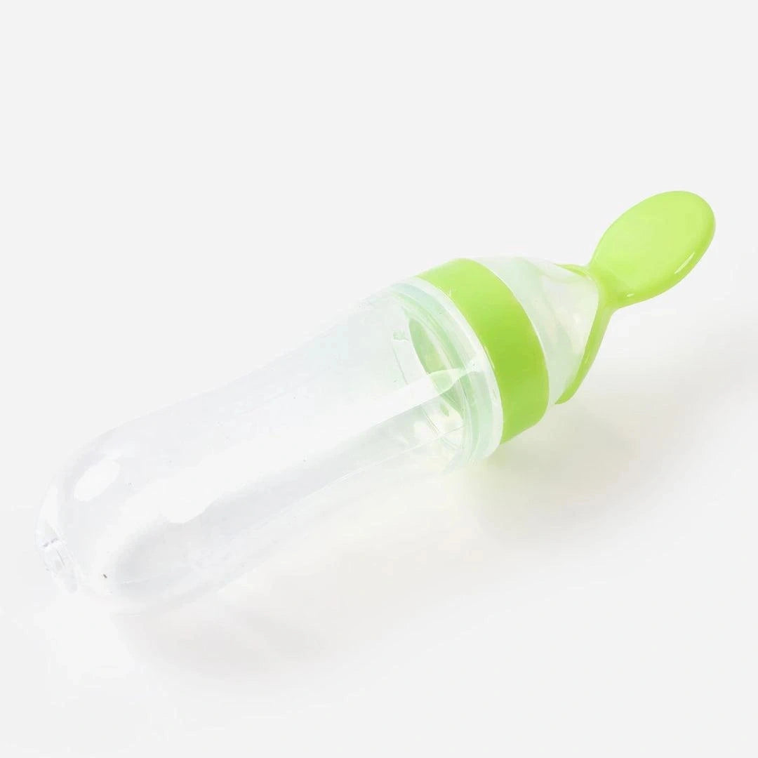 Baby silicone spoon feeder bottle detail with transparent container
