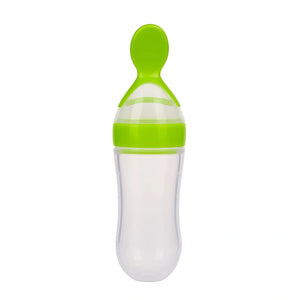 Green baby silicone spoon feeder bottle for infant feeding