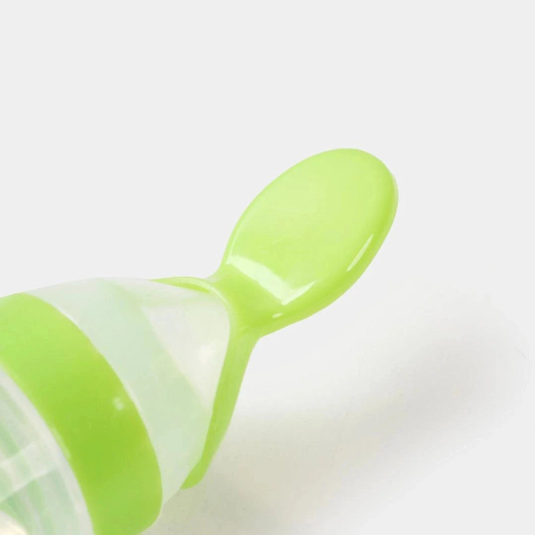 Close-up of soft silicone spoon tip on baby feeder bottle